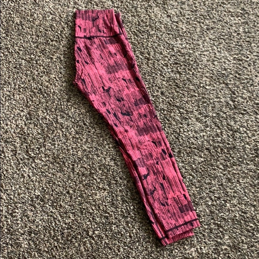 Pink and black Lululemon leggings